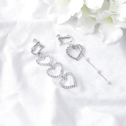Second supplied view of triple-heart asymmetric clip earrings