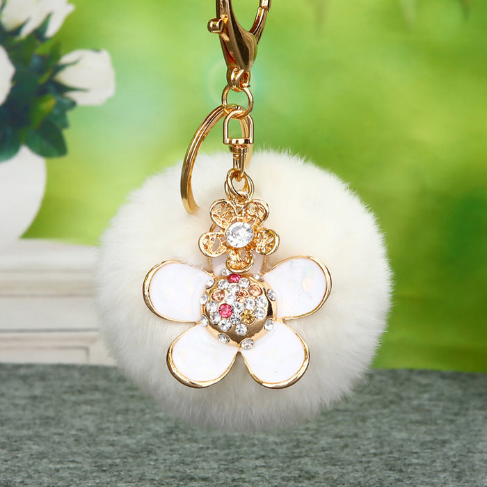 Jeweled Daisy Plush Pom Pom Keychains in Fifteen Pictured Colors