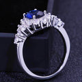 Deep Blue Oval Solitaire Floral Cluster Ring Silver Tone view 4