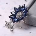 Navy Crystal Flower Brooch With Curved Leaf Stem in Two Finishes view 3