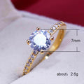 Gold Tone Round Solitaire Ring With Clear Stone Band view 5