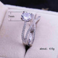 Silver Tone Spiral Ring with Round Clear Stone Design view 5