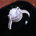 Silver Floating Round Stone Halo Ring In A Polished Decorative Design view 1