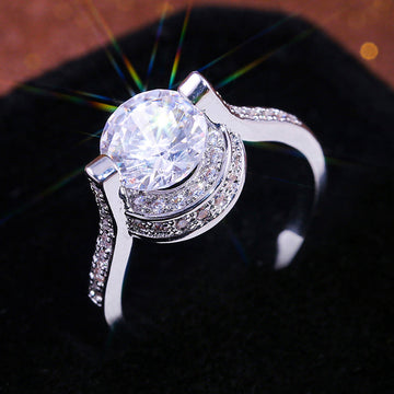 Silver Floating Round Stone Halo Ring In A Polished Decorative Design