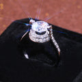 Silver Floating Round Stone Halo Ring In A Polished Decorative Design view 2