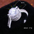 Silver Floating Round Stone Halo Ring In A Polished Decorative Design view 5