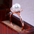 Rose Gold Pearl Halo Ring Round Center Clear CZ Border view 4