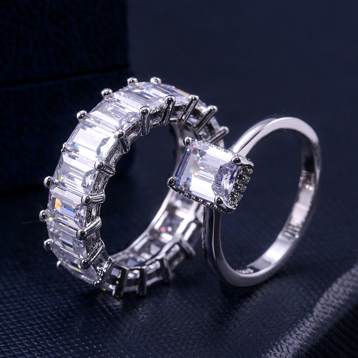 Silver Emerald Cut Eternity Band In A Polished Decorative Design