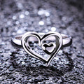 Silver Tone Interlocking Heart Ring With Clear Accents view 1