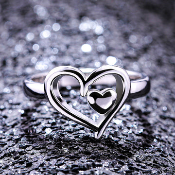 Silver Tone Interlocking Heart Ring With Clear Accents