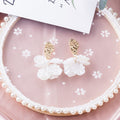Gold Textured Oval and White Petal Cluster Stud Earrings view 1