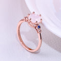 Rose Gold Tone Pink Oval Ring With Blue Side Stones view 3
