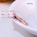 Rose Gold Tone Pink Oval Ring With Blue Side Stones view 5