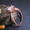 Rose Gold Tone Round Solitaire Ring In A Polished Decorative Design view 3