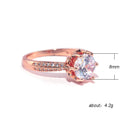 Rose Gold Tone Round Solitaire Ring In A Polished Decorative Design view 5