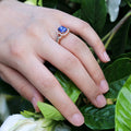 Blue Emerald Cut Crystal Halo Ring in Rose Gold Tone view 3