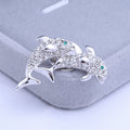 Pair of Rhinestone Dolphin Brooches with Pale Aqua Accents view 2