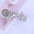 Pair of Rhinestone Dolphin Brooches with Pale Aqua Accents view 3