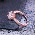 Rose Gold Tone Round Solitaire Ring In A Polished Decorative Design view 4