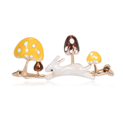 Front product view of the mushroom brooch pin in gold and yellow