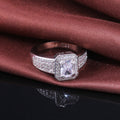 Silver Tone Emerald Cut Halo Ring with Pavé Band Design view 2