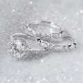 Round Center Stone Three Piece Ring Set With Clear Stone Accents view 1