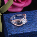 Two Tone Bow Ring with Round Clear Center Stone Design view 3