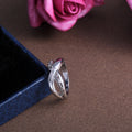 Silver Tone Polished Crossover Ring With Clear Accents view 3