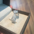 Triple Row Crossover Ring With Round Clear Center Stone view 3