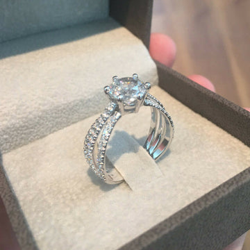 Triple Row Crossover Ring With Round Clear Center Stone