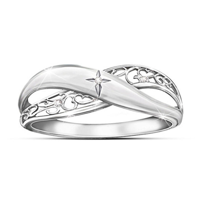 Silver Tone Polished Crossover Ring With Clear Accents