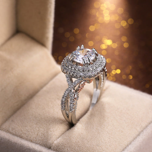 Silver Tone Round Stone Layered Halo Ring with Clear Stone Accents shown in styled view