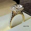Gold Tone Raised Halo Ring with Round Clear Center Stone view 5