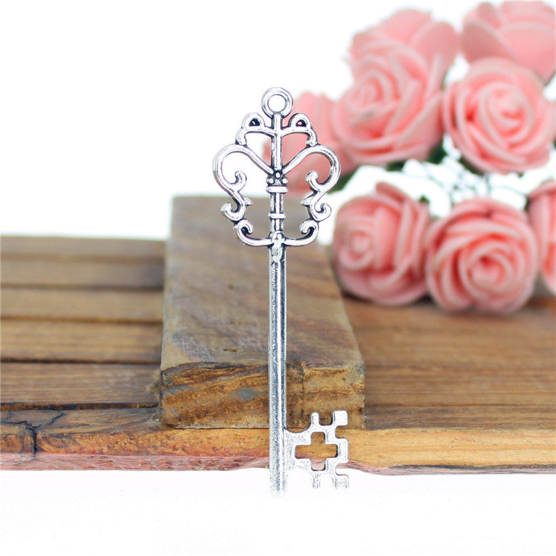 Vintage Double-Sided Floral Vine Key Charm Pendant 53x18mm