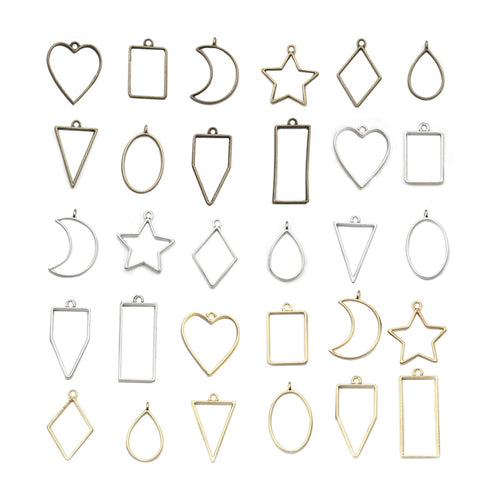 Metallic assorted shape charms arranged on a light background