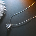 Clear Faceted Teardrop Crystal Pendant on an Invisible Cord Necklace view 4