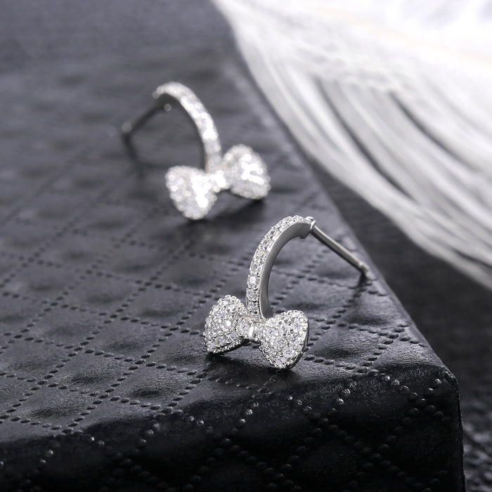 Bow Drop Stud Earrings With Slim Silver Tone Chain