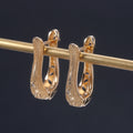 Gold Tone U Shape Hoop Earrings with Clear Stone Row view 3