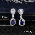 Blue Teardrop Crystal Halo Drop Earrings in Silver Tone view 5