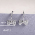 Bow Drop Stud Earrings With Slim Silver Tone Chain view 5