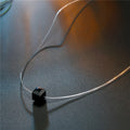 Black Faceted Square Crystal Pendant on an Invisible Cord Necklace view 5