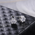 Silver Tone Daisy Stud Earrings with Clear Centers view 6