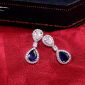 Blue Teardrop Crystal Halo Drop Earrings in Silver Tone view 3