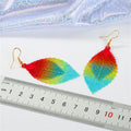 Layered Skeleton Leaf Drop Earrings in Five Metallic Colorways view 3