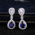 Blue Teardrop Crystal Halo Drop Earrings in Silver Tone view 1