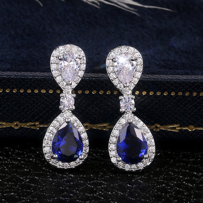 Blue Teardrop Crystal Halo Drop Earrings in Silver Tone
