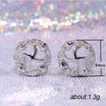 Silver Tone Pinwheel Stud Earrings with Clear Stones view 5
