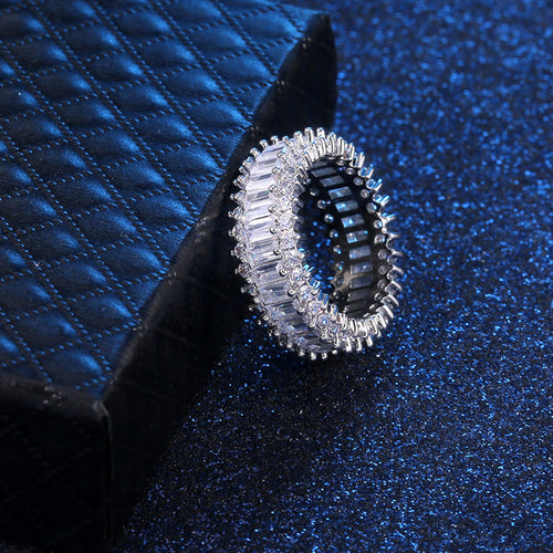 Silver Tone Baguette Stone Eternity Band Ring with Clear Stone Accents shown in styled view