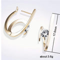 Gold Tone Open Oval Stud Earrings with Clear Stone Accent view 2