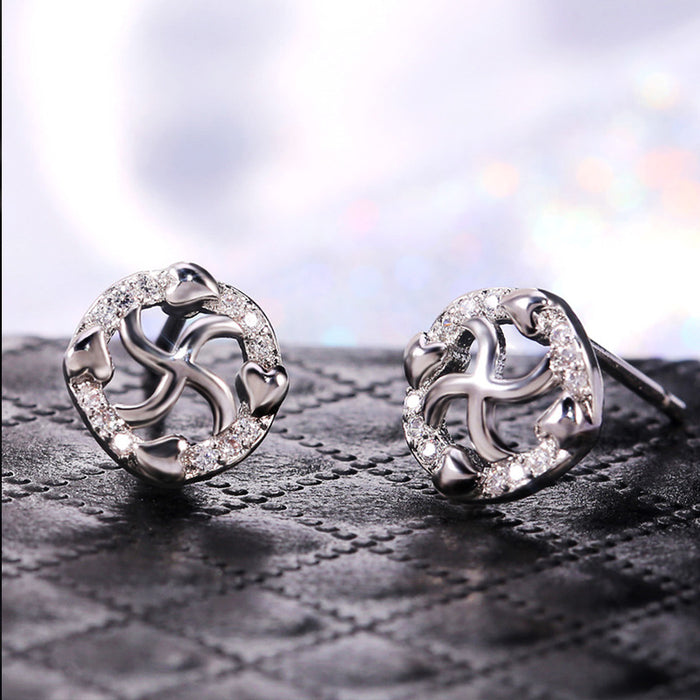 Silver Tone Pinwheel Stud Earrings with Clear Stones